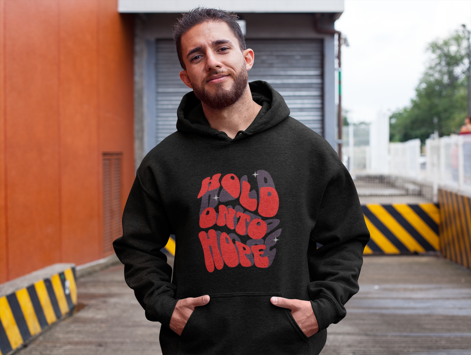 mockup-of-a-man-wearing-a-heather-hoodie-at-a-parking-lot-28625_2